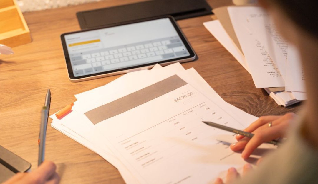 Quotations vs Invoices - Business owner working