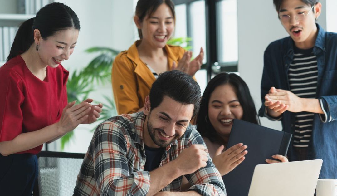 Singapore startup founders launching a business in a modern co-working space