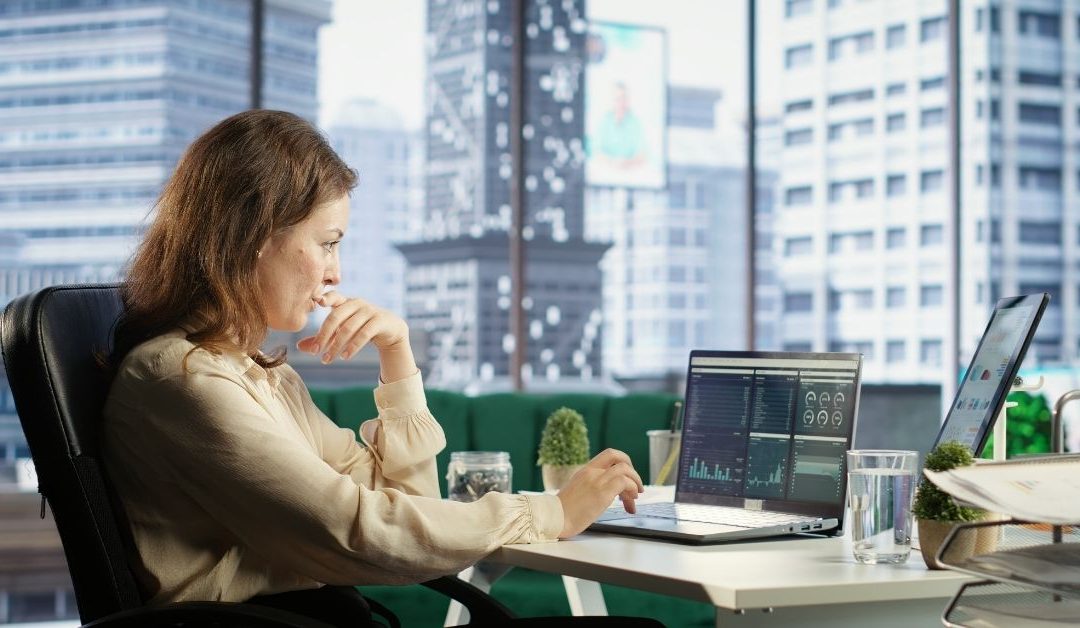 Founder reviewing Singapore business finances and calendar planning for financial year end.